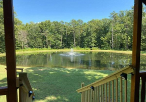 Serene 1BR Cabin near NC Z00 with Loft & Waterview
